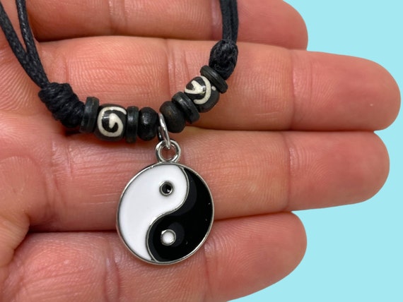 Taoist Yin Yang Cross Necklace: Embrace Harmony, Balance, and Spiritual Strength